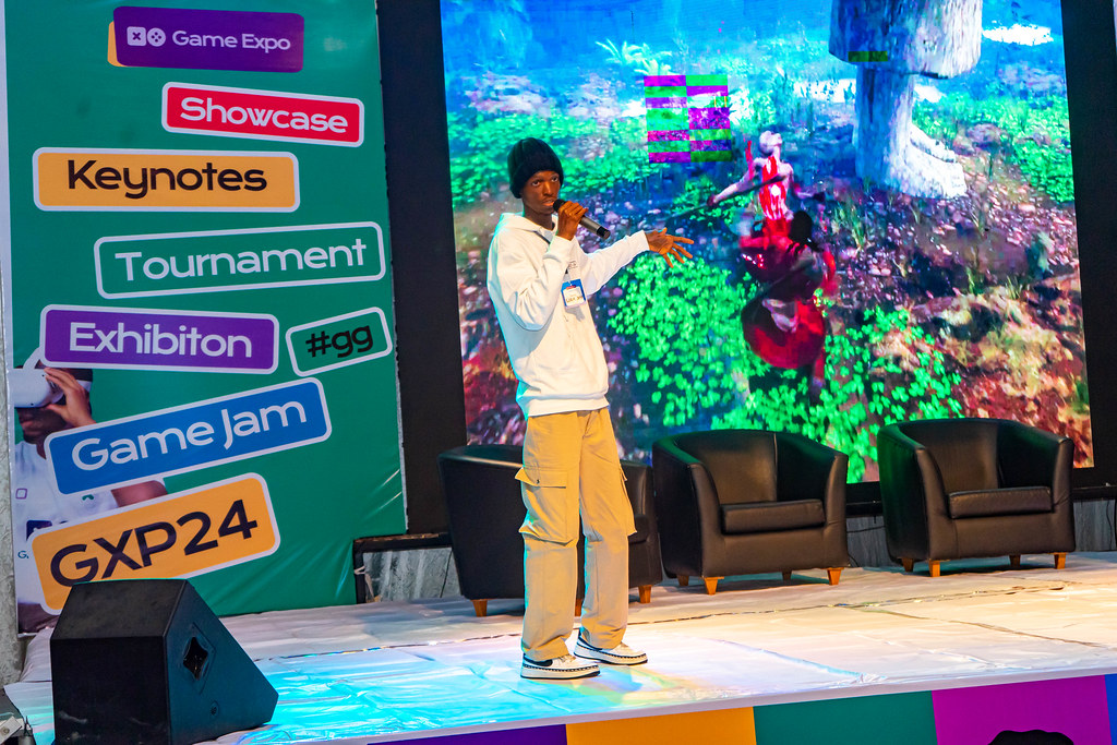 Esports competitors and lively crowd at the tournament arena