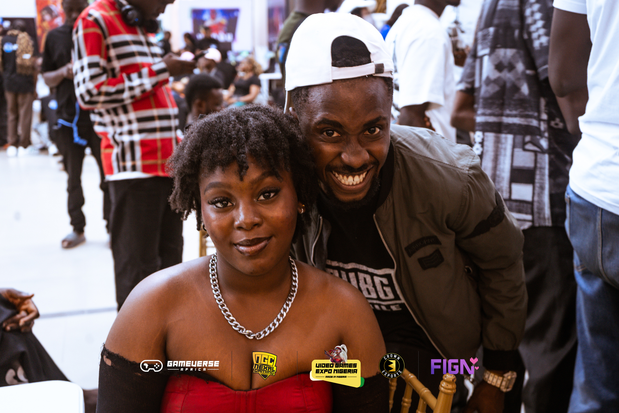 Expo attendees and gaming enthusiasts smiling together