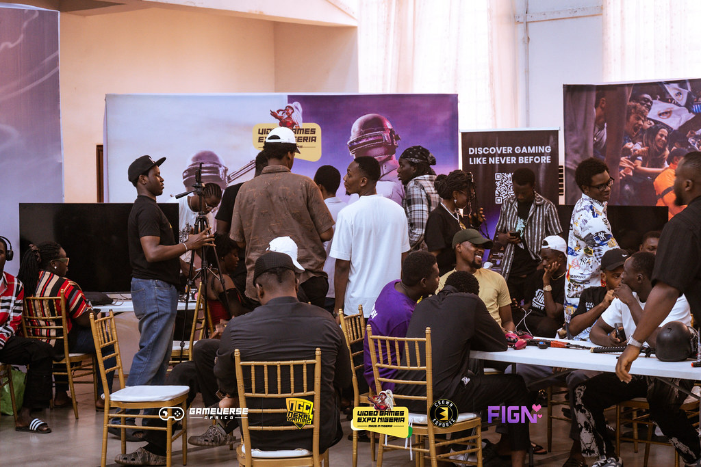 Vibrant exhibition hall and gaming crowd